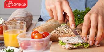 Sandwich being cut for a healthy lunch